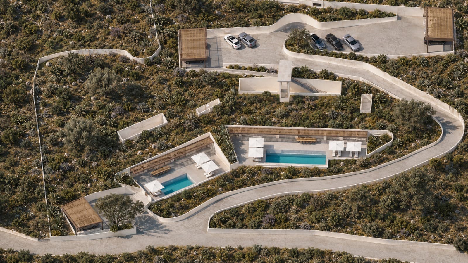 The arrival: parking above, the road dropping past the lower houses.