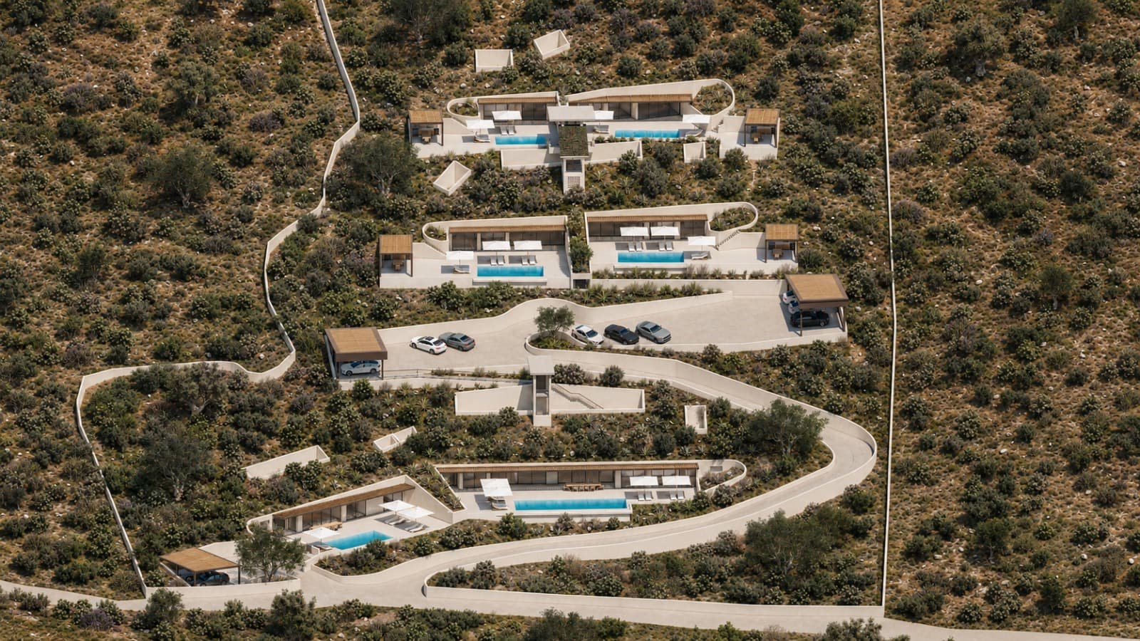 The full site, with the access road threading between the houses.