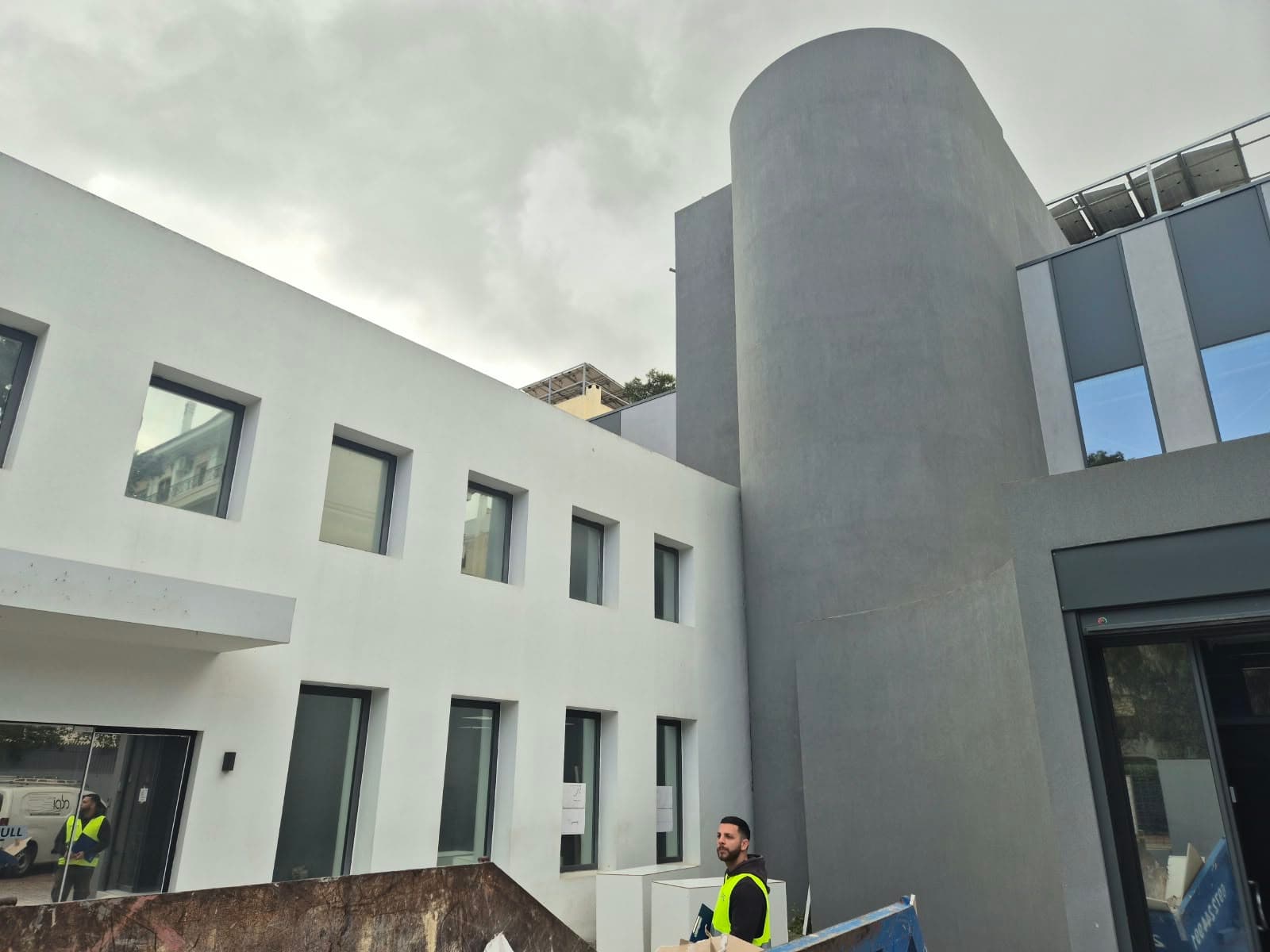 The building at handover, before the forecourt was finished.