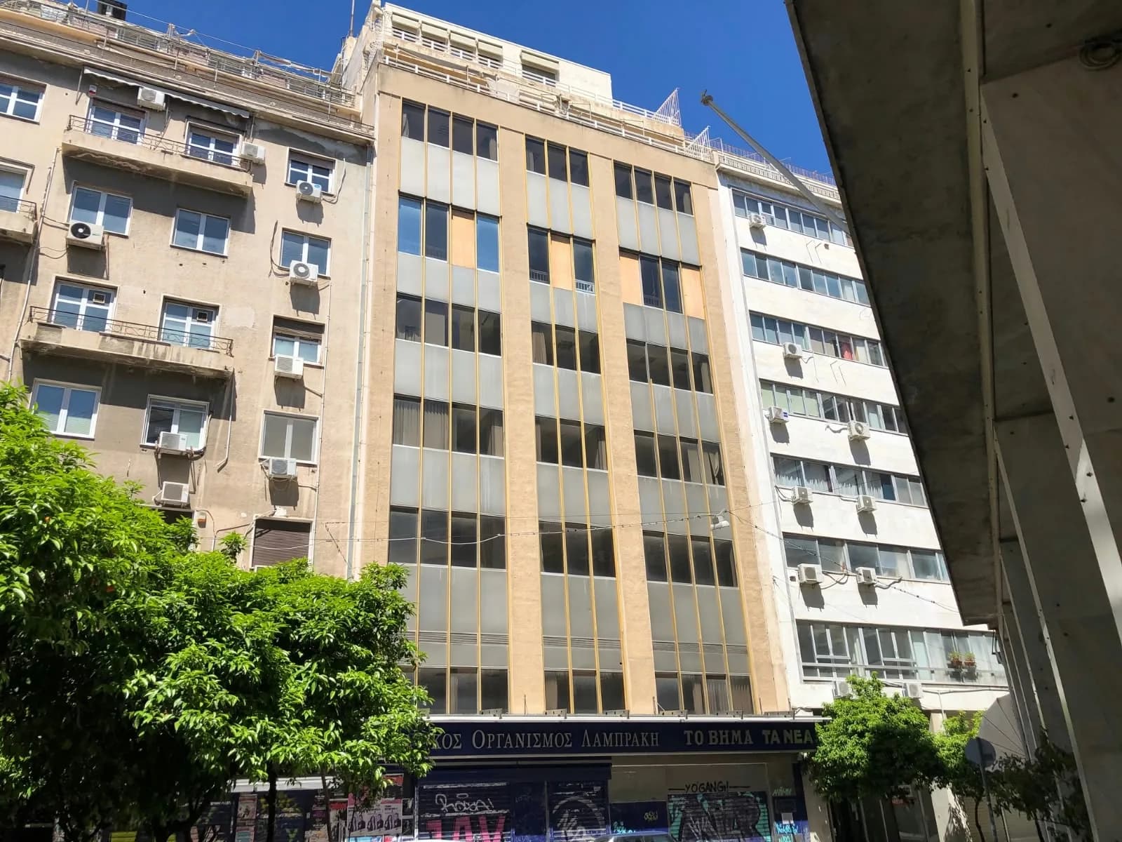 The building before the works, still under the Lambrakis Press sign.