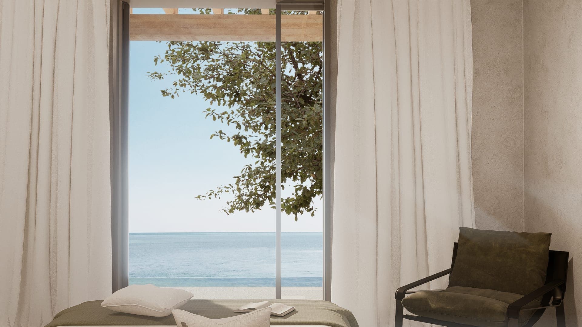 Bedroom with a full-height window to the water.