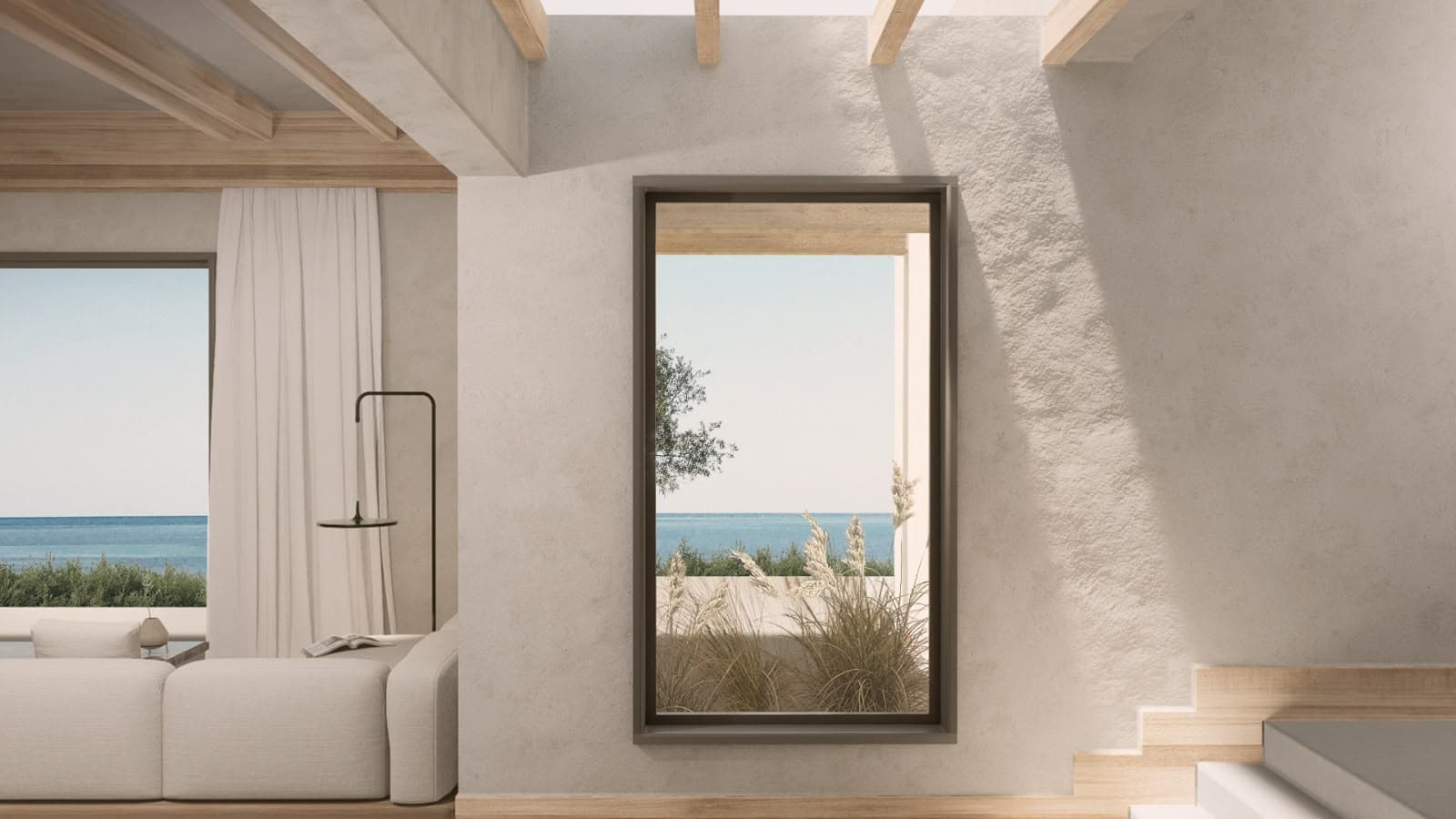 A window cut through the wall to the sea, beside the stair.