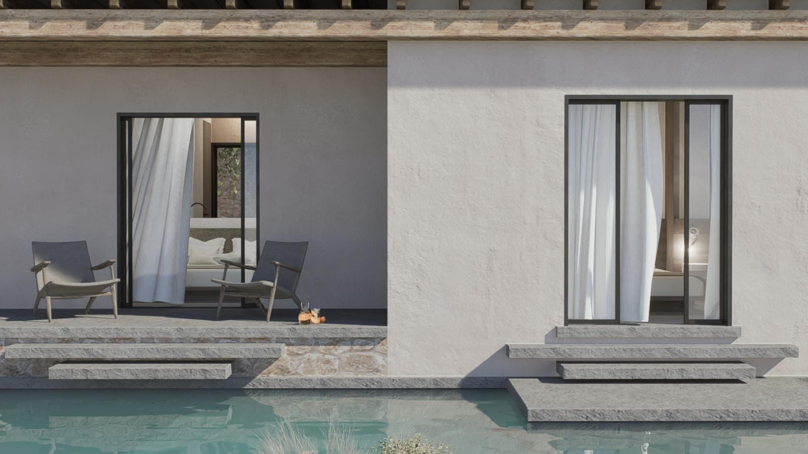 Steps down to the pool between two of the houses.