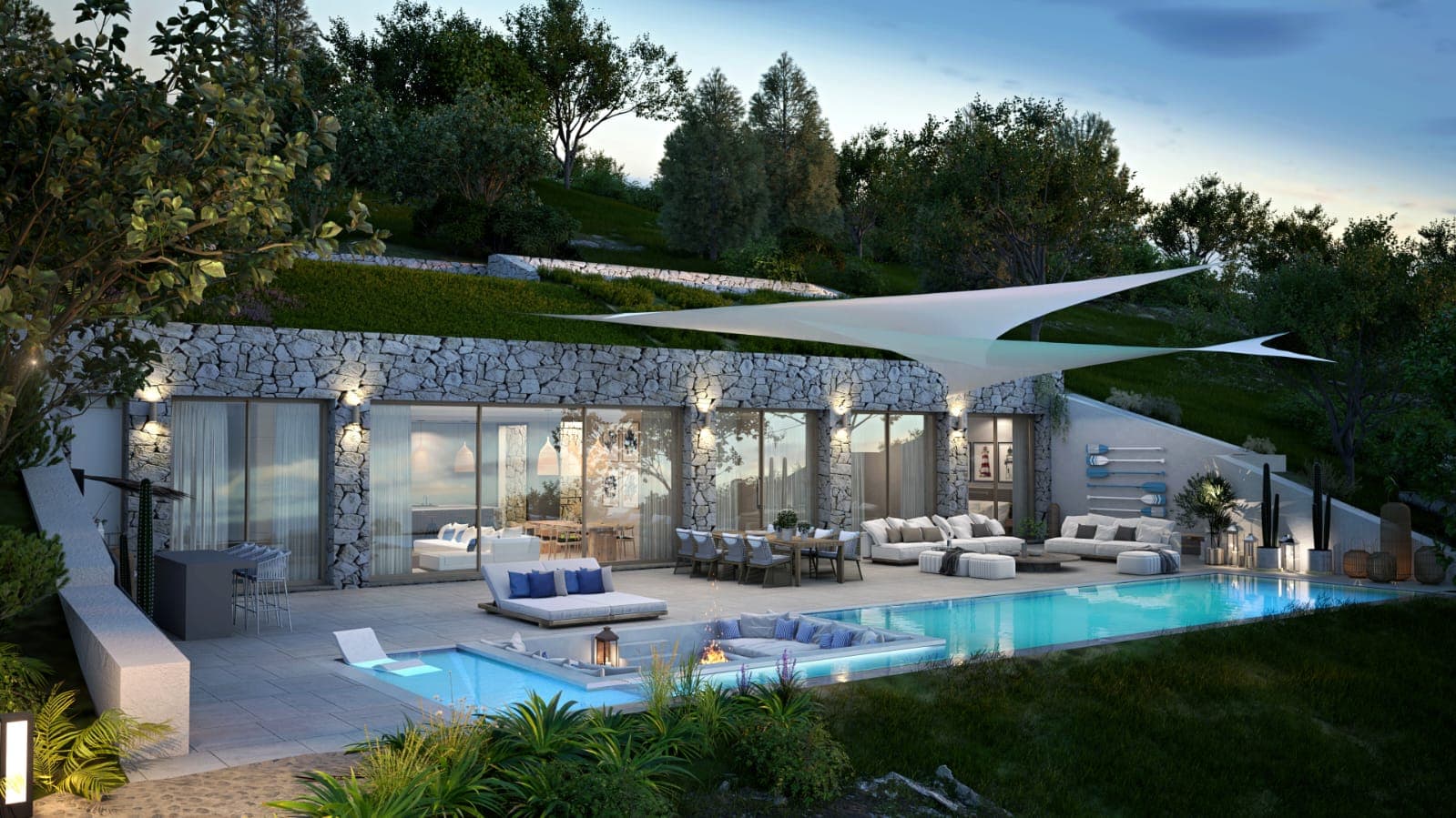 The terrace and pool at dusk.