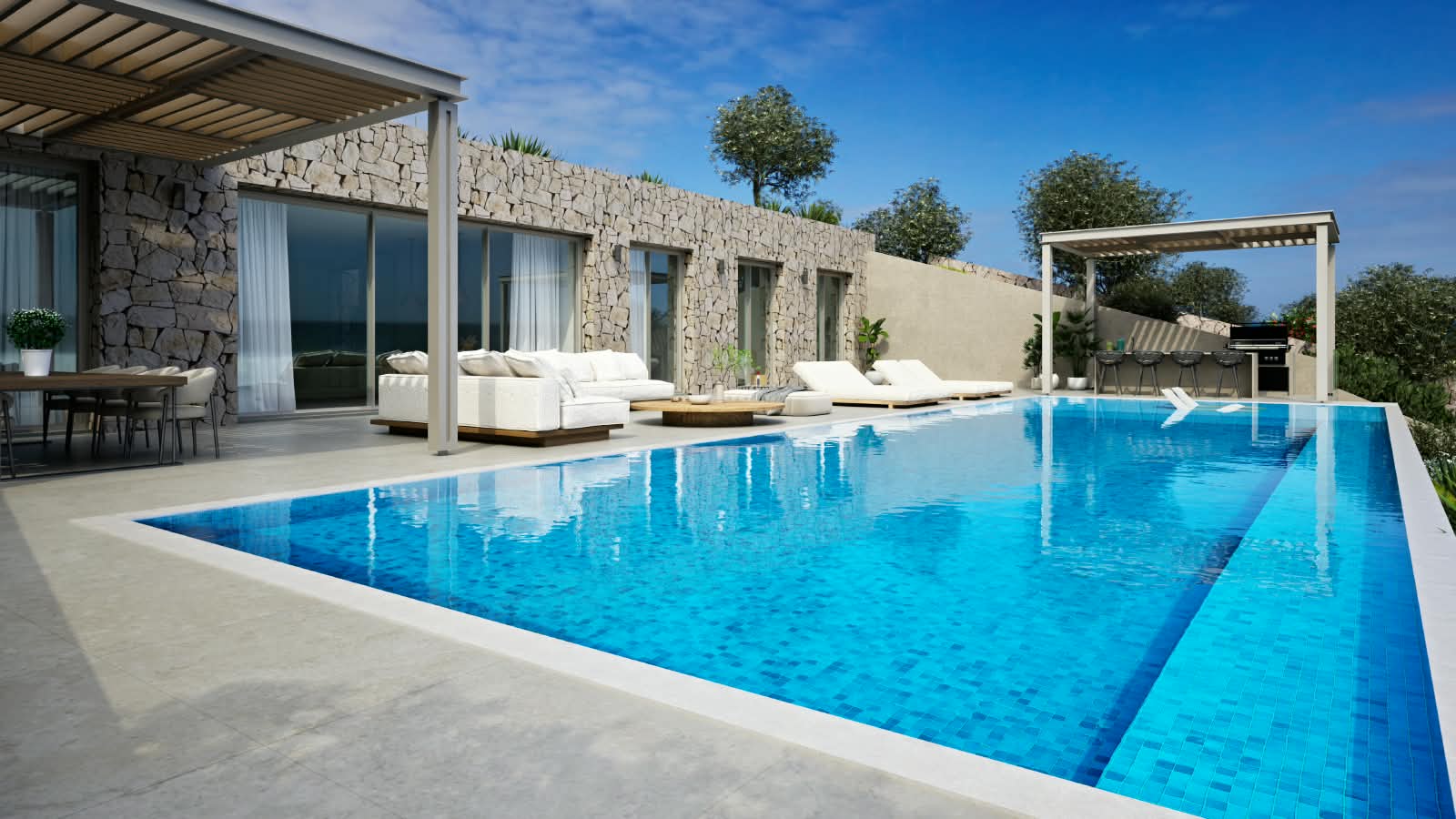 Stone-clad villa with its pool and covered terrace.