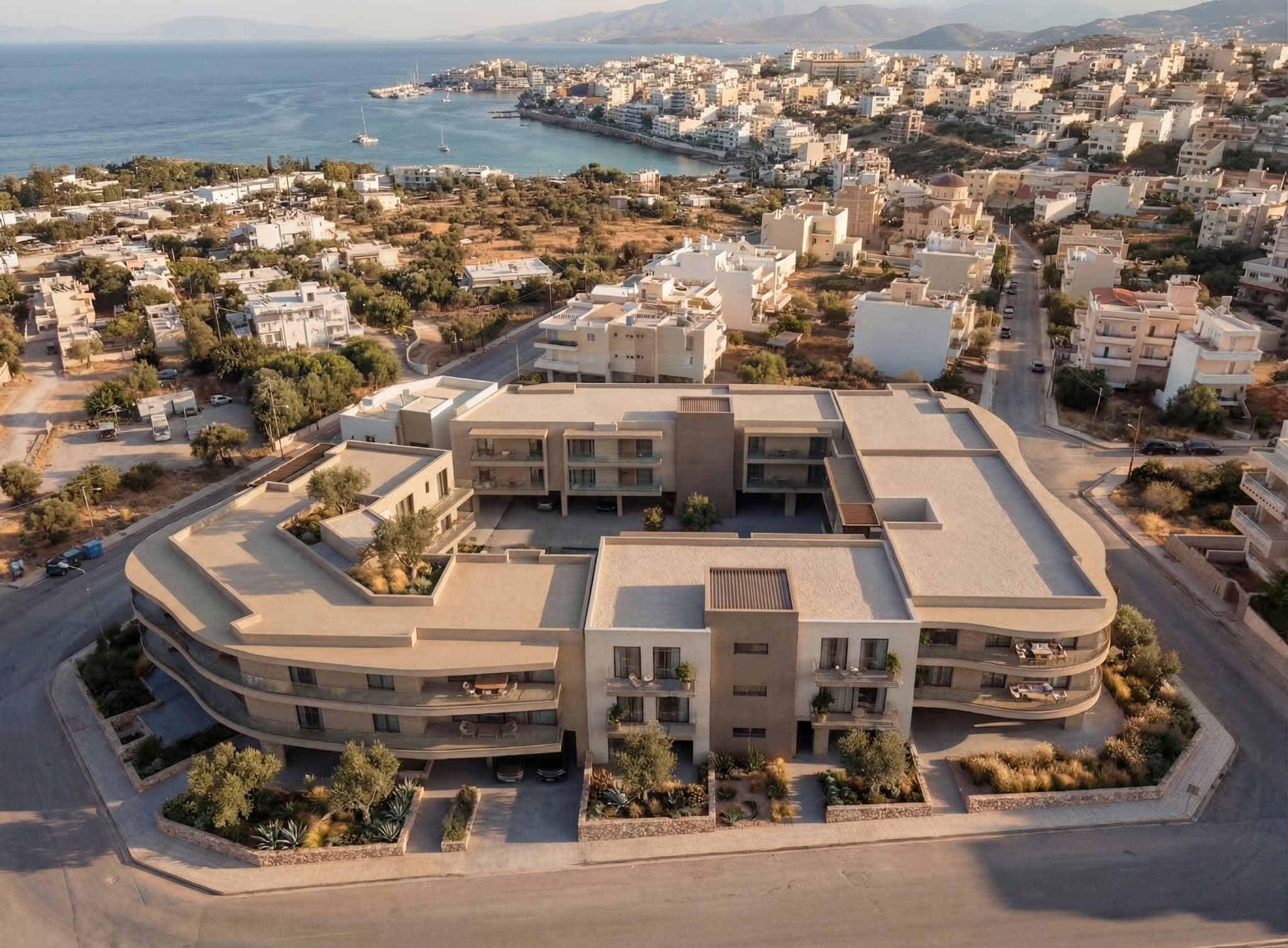 The complex seen from above, in its setting between the town and the bay.