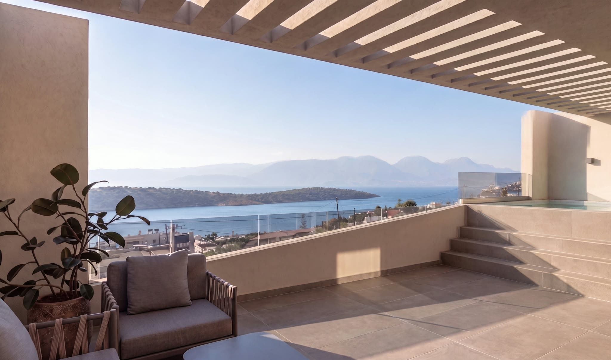The view from a loggia across the bay to the mountains beyond.